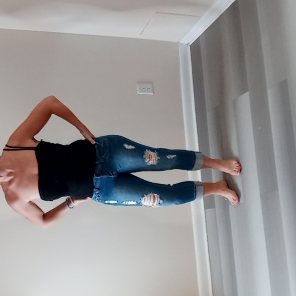 Cute Distressed Low Rider Capris with Rolled Cuff Legs